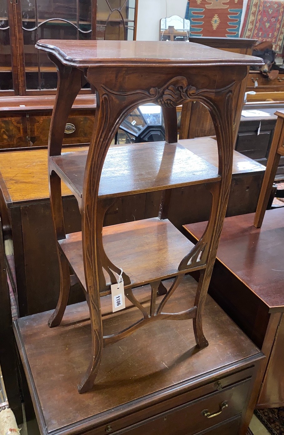 An early 20th century French Art Nouveau mahogany three tier etagere, width 42cm, depth 30cm, height 84cm